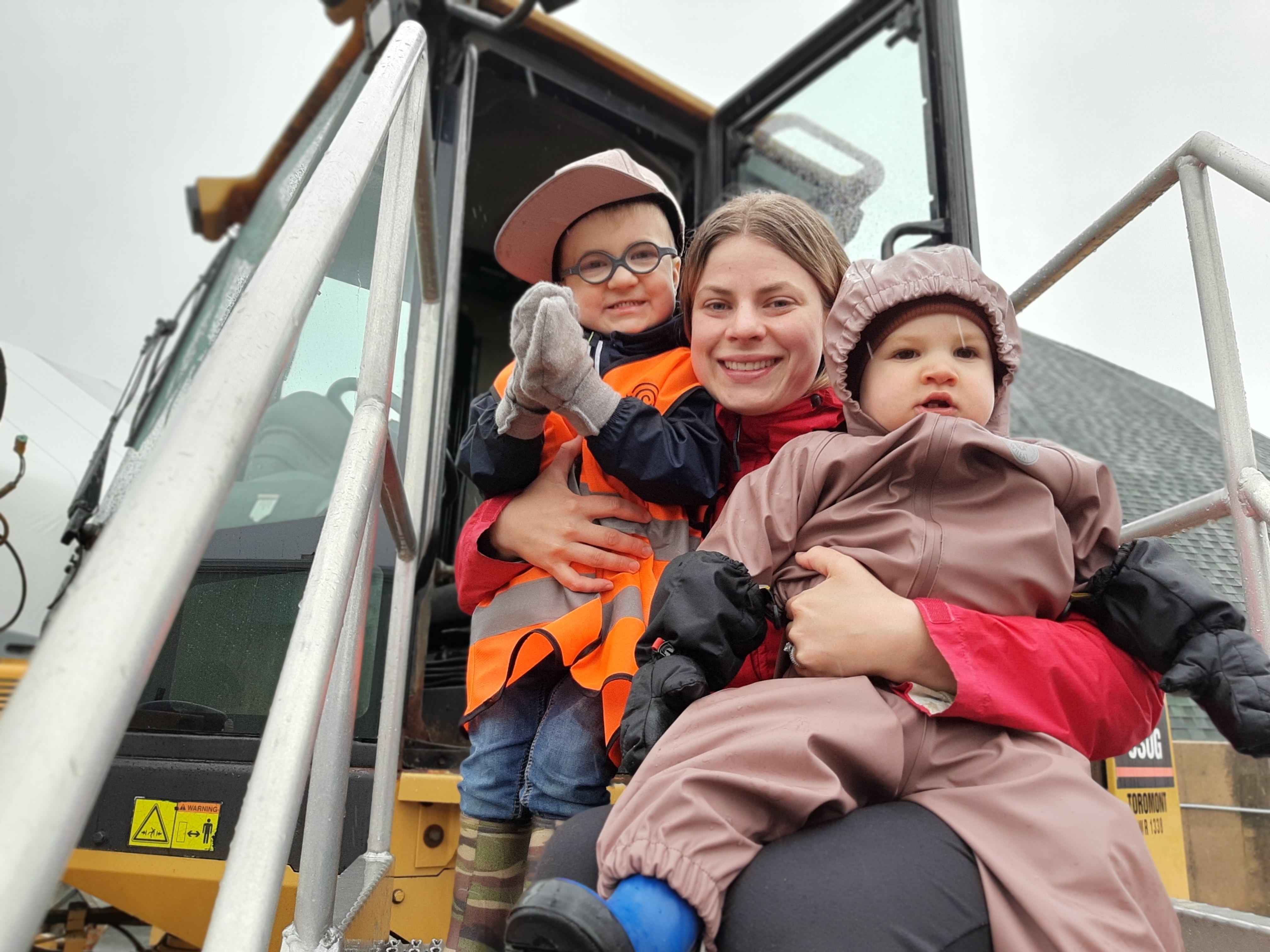 Mother and kids in a big truck