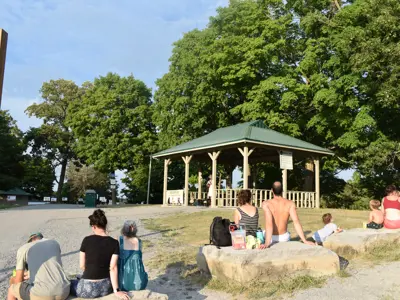 People sitting listening to music.